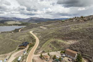 Bird's eye view with a water and mountain view