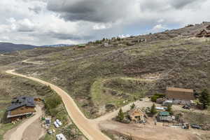 Birds eye view of property featuring a mountain view