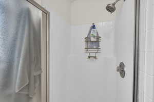 Bathroom with a shower stall