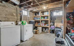 Below grade area featuring separate washer and dryer