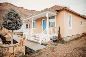 View of front of home and a mountain view
