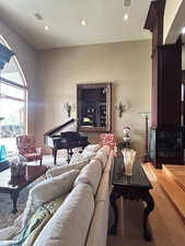 Living room featuring visible vents and recessed lighting