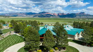 Aerial view featuring a rural view and a mountain view