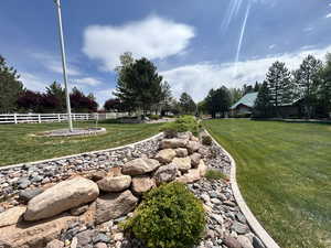 View of yard with fence