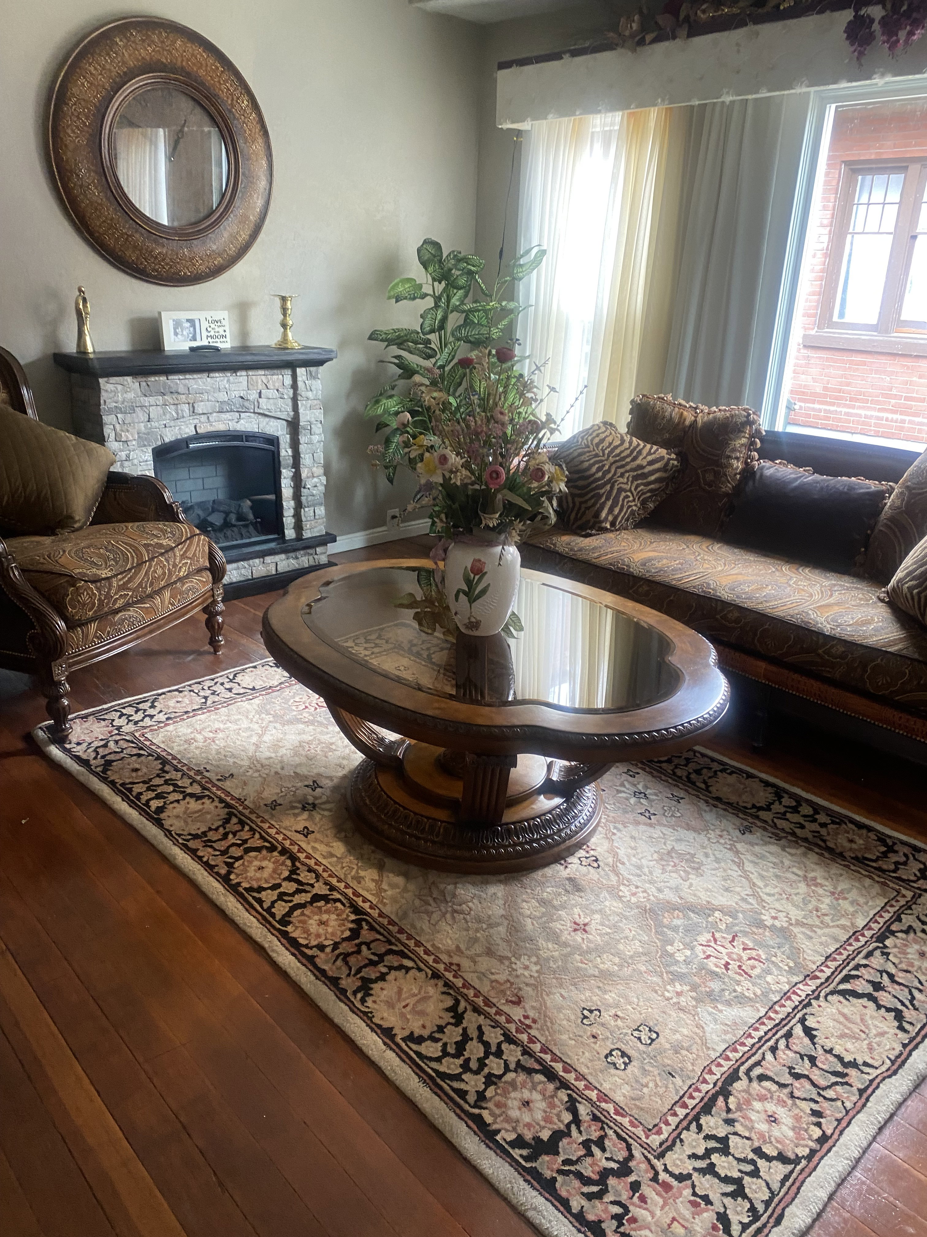Living area featuring a fireplace and hardwood / wood-style floors