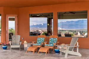 Exterior space featuring a mountain view and concrete floors