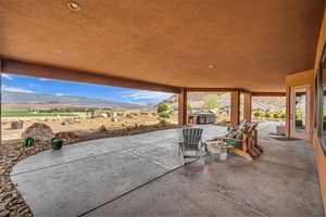 View of patio / terrace featuring a mountain view