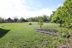 View of yard with fence