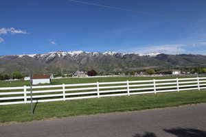 Property view of mountains with a rural view