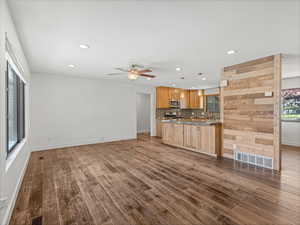 Kitchen with recessed lighting, backsplash, visible vents, and appliances with stainless steel finishes