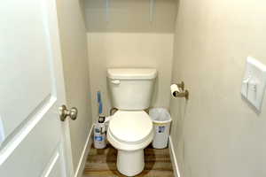 Bathroom with baseboards and toilet