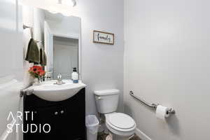 Half bath with toilet and vanity