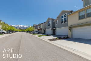 View of road featuring a residential view and a mountain view