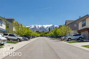 View of road with a residential view and a mountain view