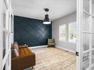 Den/office with board and batten finish