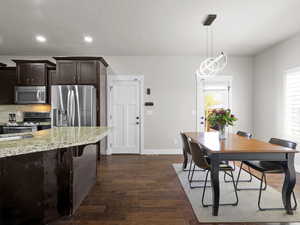 Kitchen w/bar and large dining area