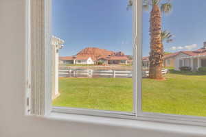 Interior space with a water and mountain view and a residential view