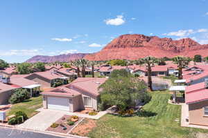Mountain view featuring nearby suburban area