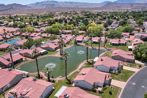 Aerial view of residential area with a water and mountain view