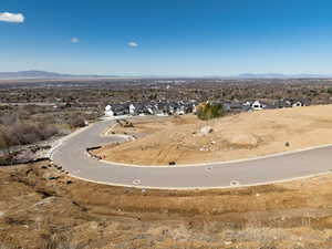 Drone / aerial view featuring a residential view and a mountain view
