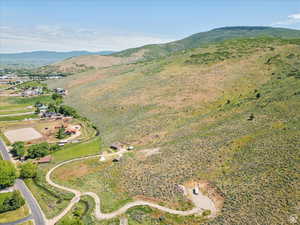 Birds eye view of property featuring a mountain view