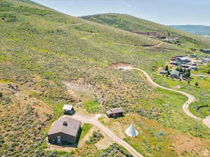 Drone / aerial view featuring a mountain view
