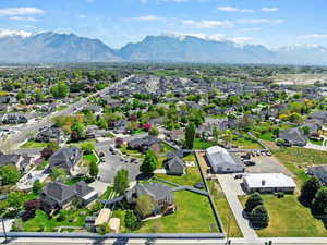 Drone / aerial view featuring a mountain view and a residential view