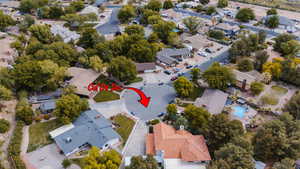 Birds eye view of property with a residential view