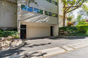 Garage featuring driveway