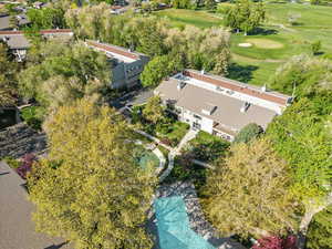 Birds eye view of property with view of golf course