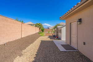 View of yard with a patio and a fenced backyard
