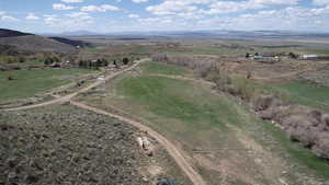 Aerial view featuring a mountain view and a rural view