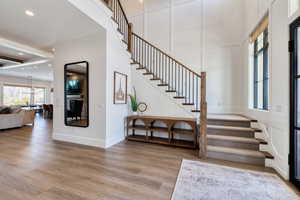 Rich engineered wood flooring throughout the main level
