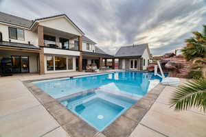 50 x 25 Ft salt water pool and hot tub. Depth to 9 feet for diving.