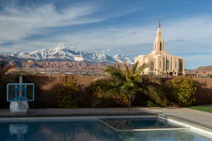 Main level backyard views of mountains and temple