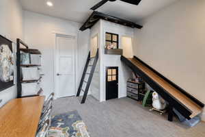 Bedroom 2 with a double-level playhouse