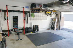 Exercise room with a garage