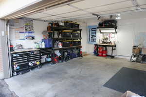 Garage featuring a workshop area