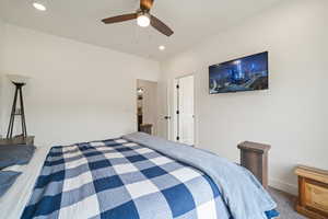 Bedroom featuring recessed lighting, baseboards, a ceiling fan, and carpet floors