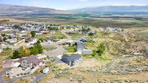 Aerial view featuring a residential view and a mountain view