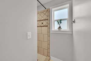 Bathroom with a tile shower