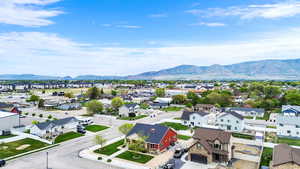 Aerial view of residential area with a mountain backdrop