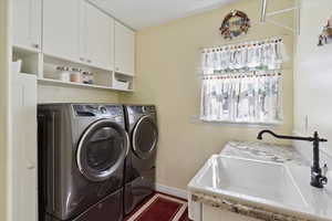 Updated bathroom with storage, granite tops and sink
