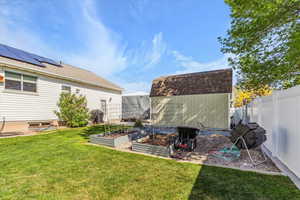 Storage shed and garden