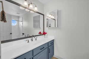 Bathroom with visible vents and vanity