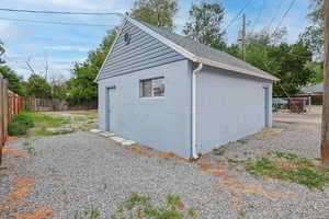 Oversized garage with stairs to fully finished attic storage space