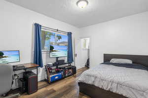 Primary Bedroom with ensuite bath and closet with a window