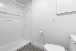 Main hall bath with private shower/toilet room