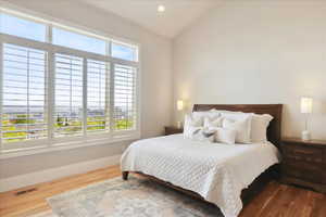 Primary Suite with lofted ceiling and sweeping views