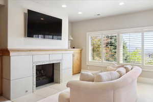 Lower Level Great Room with fireplace and views